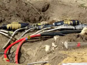 High-voltage electrical cables and wiring being installed underground, indicating professional electrical work for Perth residential or commercial properties.
