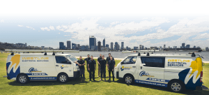 Professional Westline Electricians Perth team standing next to service vans with Perth city skyline background.